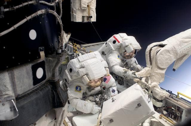 NASA image: Noguchi and Robinson during EVA 1