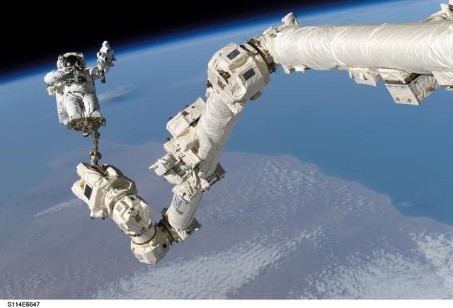 NASA image: EVA 3 - Robinson on Canadarm2