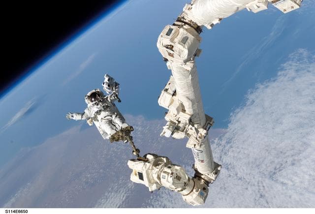NASA image: EVA 3 - Robinson on Canadarm2