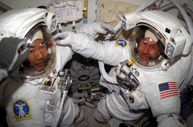 NASA image: Noguchi and Robinson in Airlock