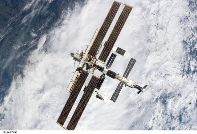 NASA image: Forward - zenith view of the ISS taken during STS-114's undocking and final flyaround