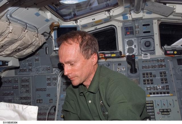 NASA image: STS-115 Pilot Ferguson on Atlantis Aft Flight Deck