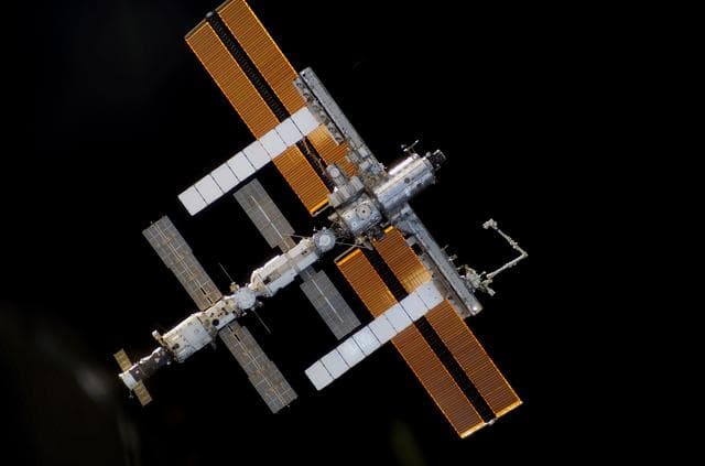 NASA image: ISS during approach of the STS-115 Space Shuttle Atlantis