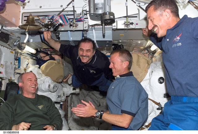 NASA image: Expedition 13 and STS-115 crewmembers reunite after docking with the ISS