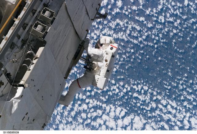 NASA image: Tanner performs first EVA during STS 115 / Expedition 13 joint operations