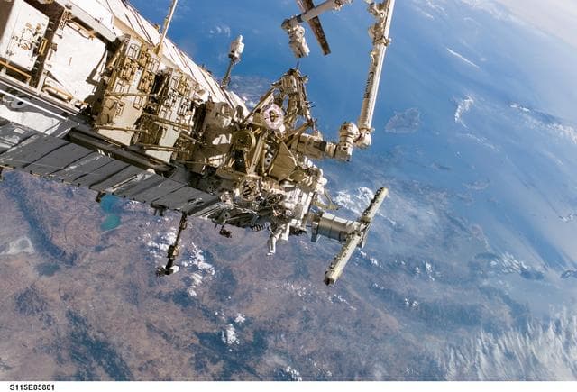 NASA image: MacLean and Burbank performing second EVA spacewalk
