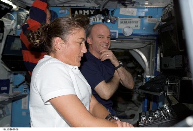 NASA image: STS-115 MS Stefanyshyn-Piper works at the SSRMS in the U.S. Laboratory