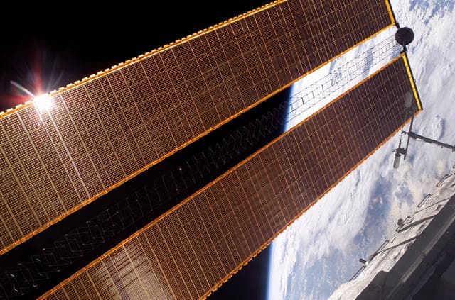 NASA image: Second set of solar arrays on the ISS during Expedition 13 / STS-115 Joint Operations