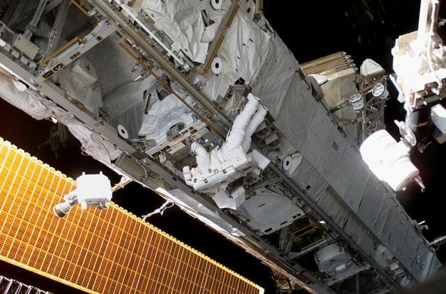 NASA image: STS-115 MS Stefanyshyn-Piper removes and replaces the S-Band Antenna BSP and XPDR during EVA