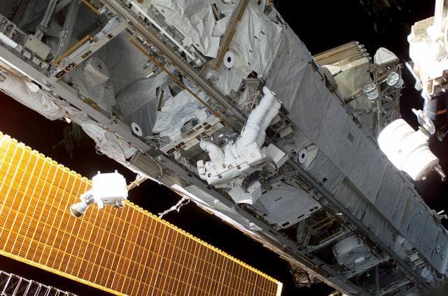 NASA image: STS-115 MS Stefanyshyn-Piper removes and replaces the S-Band Antenna BSP and XPDR during EVA