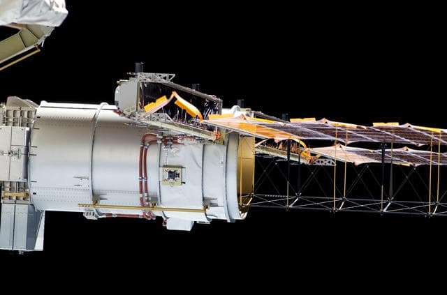 NASA image: Deployment of the P4 Truss SAW during Expedition 13 / STS-115 Joint Operations