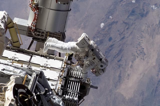 NASA image: STS-115 MS Stefanyshyn-Piper works on P3/P4 Trusses during third EVA