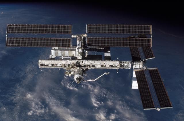 NASA image: Overall exterior view of the ISS during undocking and Flyaround Operations for STS-115 Space Shuttle Atlantis