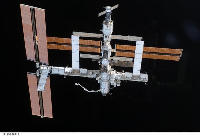 NASA image: Overall exterior view of the ISS during undocking and Flyaround Operations for STS-115 Space Shuttle Atlantis