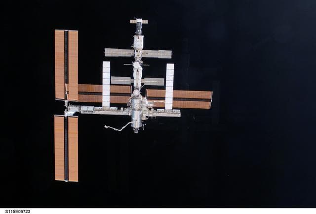 NASA image: Overall exterior view of the ISS during undocking and Flyaround Operations for STS-115 Space Shuttle Atlantis