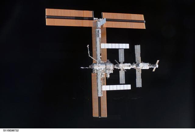 NASA image: Overall exterior view of the ISS during undocking and Flyaround Operations for STS-115 Space Shuttle Atlantis