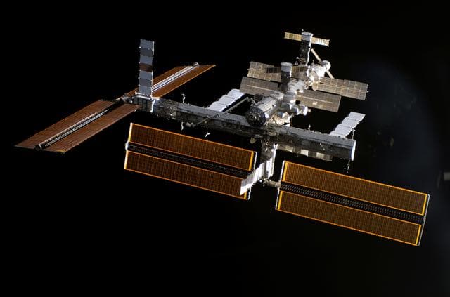 NASA image: Overall exterior view of the ISS during undocking and Flyaround Operations for STS-115 Space Shuttle Atlantis