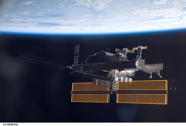 NASA image: Overall exterior view of the ISS during undocking and Flyaround Operations for STS-115 Space Shuttle Atlantis