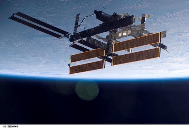 NASA image: Overall exterior view of the ISS during undocking and Flyaround Operations for STS-115 Space Shuttle Atlantis