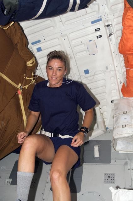 NASA image: STS-115 MS Stefanyshyn-Piper exercises on the CEVIS in the MDDK of the Space Shuttle Atlantis