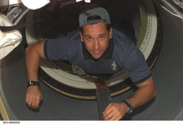 NASA image: STS-116 Pilot Oefelin in the A/L area on Space Shuttle Discovery