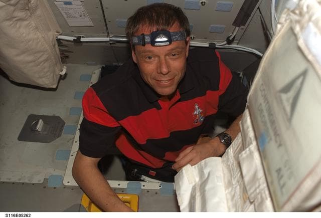 NASA image: STS-116 MS Fuglesang in the MDDK on Space Shuttle Discovery