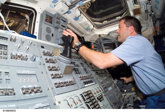 NASA image: STS-116 MS Patrick work at aft FD on Space Shuttle Discovery