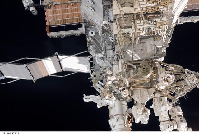 NASA image: STS-116 MS Fuglesang works at the P3/P4 Truss during EVA 1