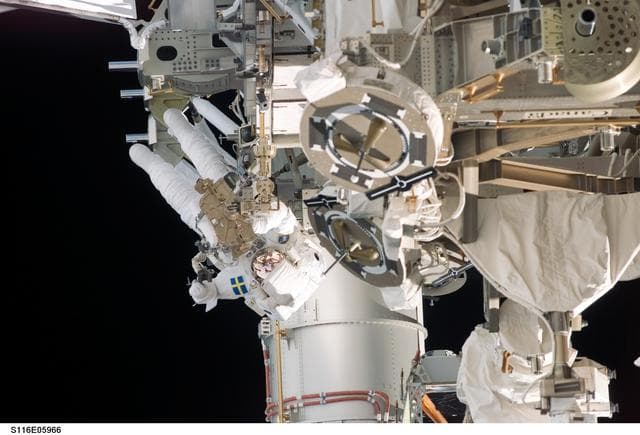 NASA image: STS-116 MS Fuglesang works at the P3/P4 Truss during EVA 1