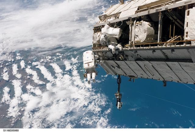 NASA image: STS-116 MS Curbeam,Jr.,and Fuglesang work on S1 Truss during EVA 1