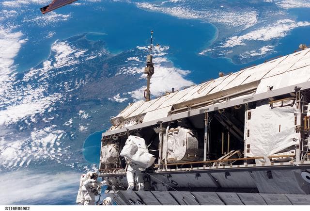 NASA image: STS-116 MS Curbeam,Jr.,and Fuglesang work on S1 Truss during EVA 1