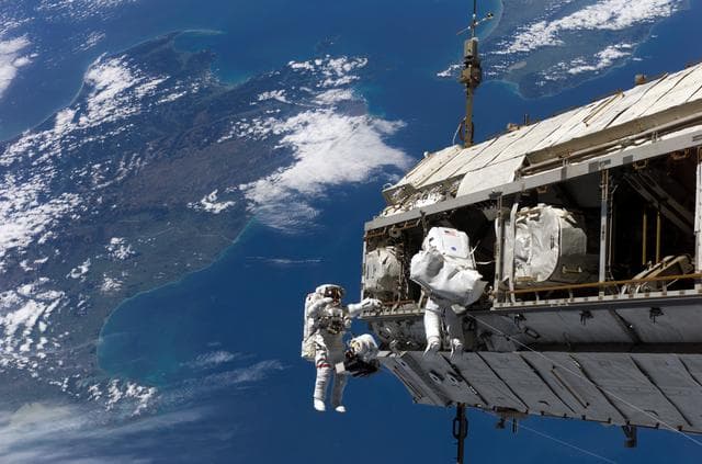 NASA image: STS-116 MS Curbeam,Jr.,and Fuglesang work on S1 Truss during EVA 1