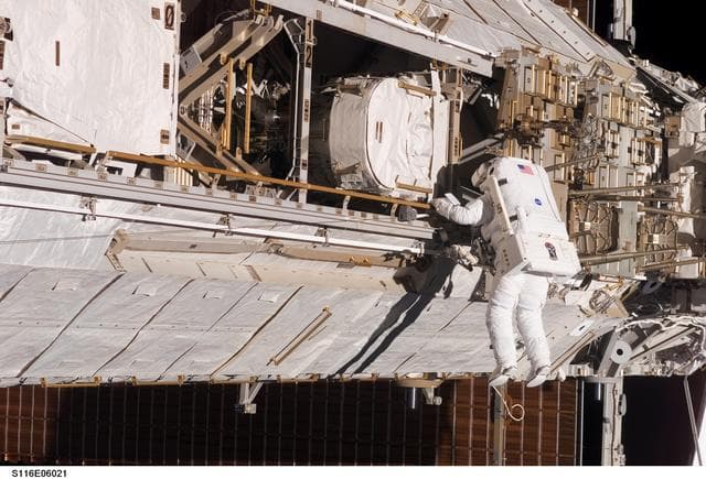 NASA image: STS-116 MS Fuglesang,works at the P1 Truss during EVA 1