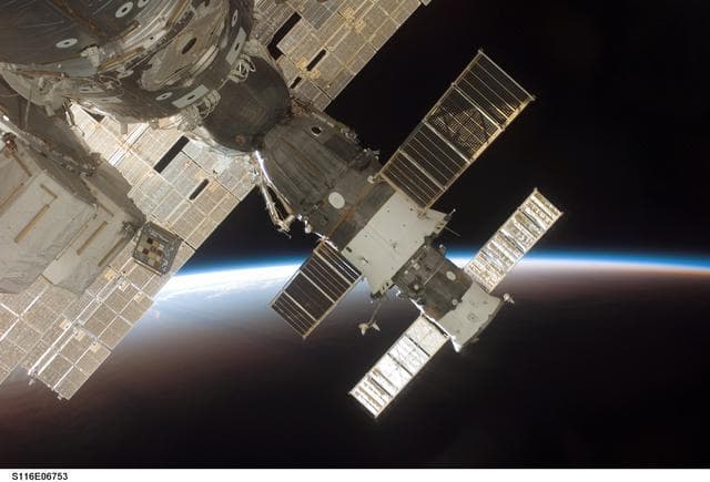 NASA image: Survey view of the FWD side of the A/L with the ESP2 during Joint Operations