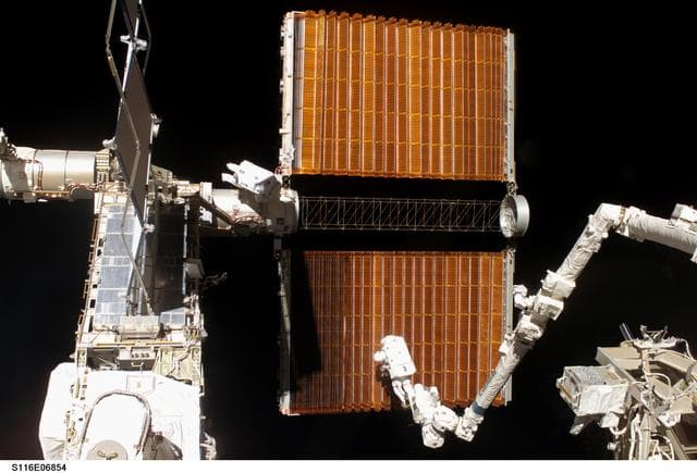 NASA image: STS-116 MS Fuglesang and Curbeam,Jr.,during EVA 4