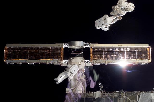 NASA image: STS-116 MS Fuglesang and Curbeam,Jr.,during EVA 4