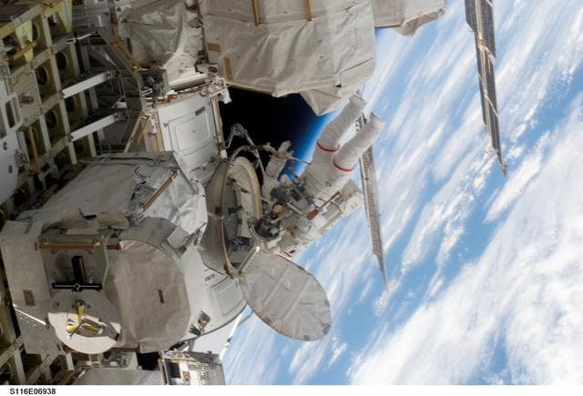 NASA image: STS-116 MS Curbeam during EVA-4 outside the Airlock