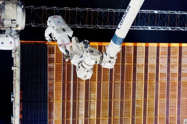 NASA image: STS-116 MS Fuglesang and Curbeam during EVA-4