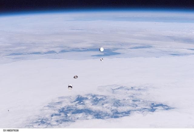 NASA image: DOD Pico-Satellite known as ANDE released from the STS-116 shuttle payload bay