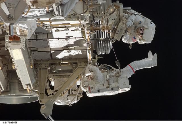Reilly and Olivas on EVA 1 during STS-117