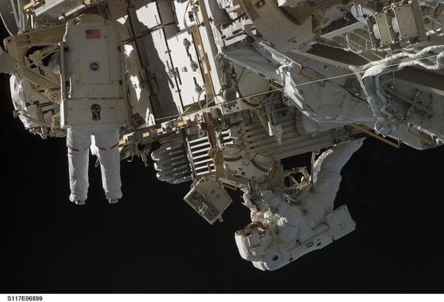 Reilly and Olivas on EVA 1 during STS-117