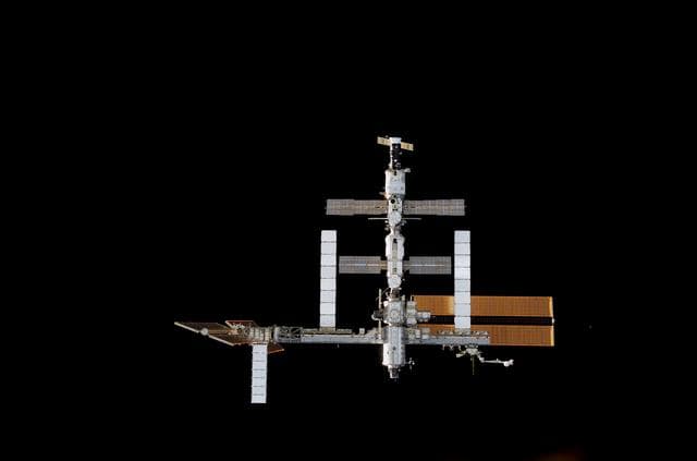 NASA image: ISS during rendezvous and docking of STS-117 Space Shuttle Atlantis