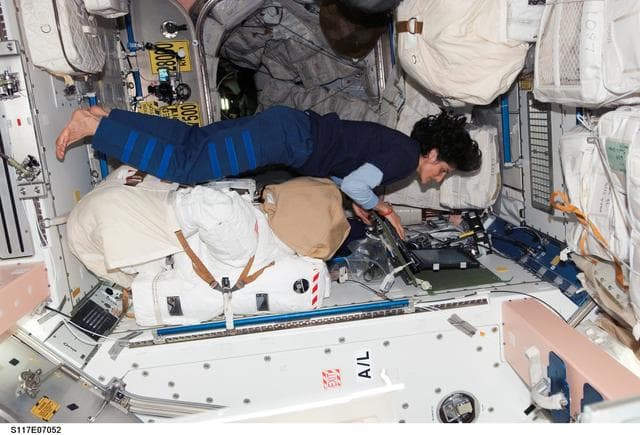 NASA image: Williams works at laptop computer in the Node 1 during Joint Operations