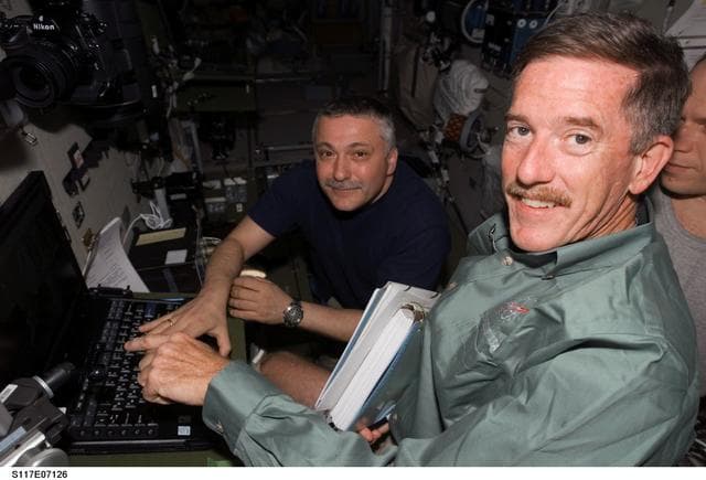 NASA image: Reilly,Yurchikhin,and Kotov in the SM during Joint Operations