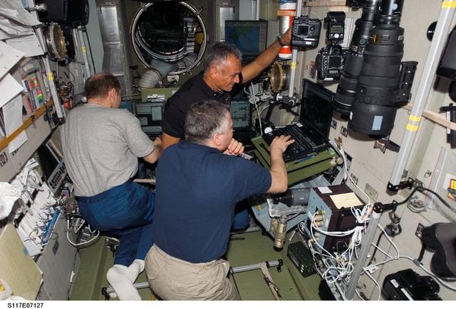 NASA image: Reilly,Yurchikhin, and Kotov in the SM during Joint Operations
