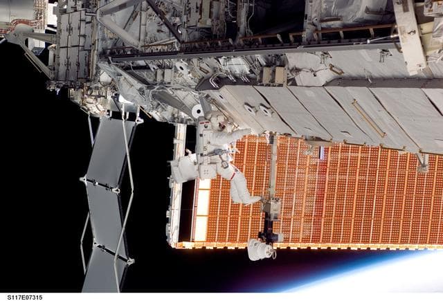 NASA image: Forrester works at the P6 Truss during EVA 2 on STS-117 Mission