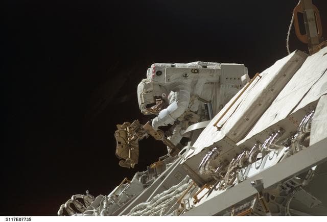 NASA image: Swanson relocates APFR on the S3/S4 Truss during EVA 4