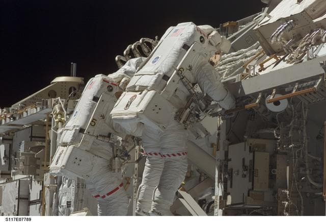 NASA image: Forrester and Swanson working on the S3 Truss during EVA 4