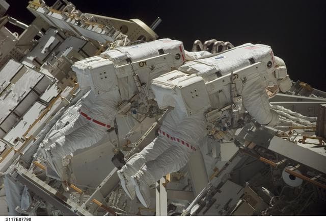 NASA image: Forrester and Swanson working on the S3 Truss during EVA 4