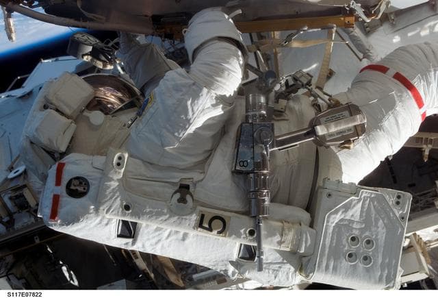 NASA image: Forrester moves to the Quest A/L during Extravehicular Activity 4